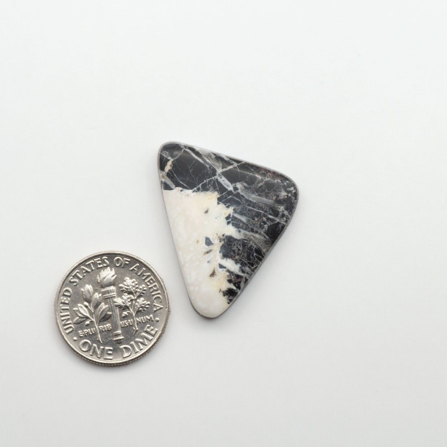 Natural White Buffalo Stone Cabochons are semi-precious gemstones cut into shapes ideal for jewelry-making, making them an excellent choice for artisans.