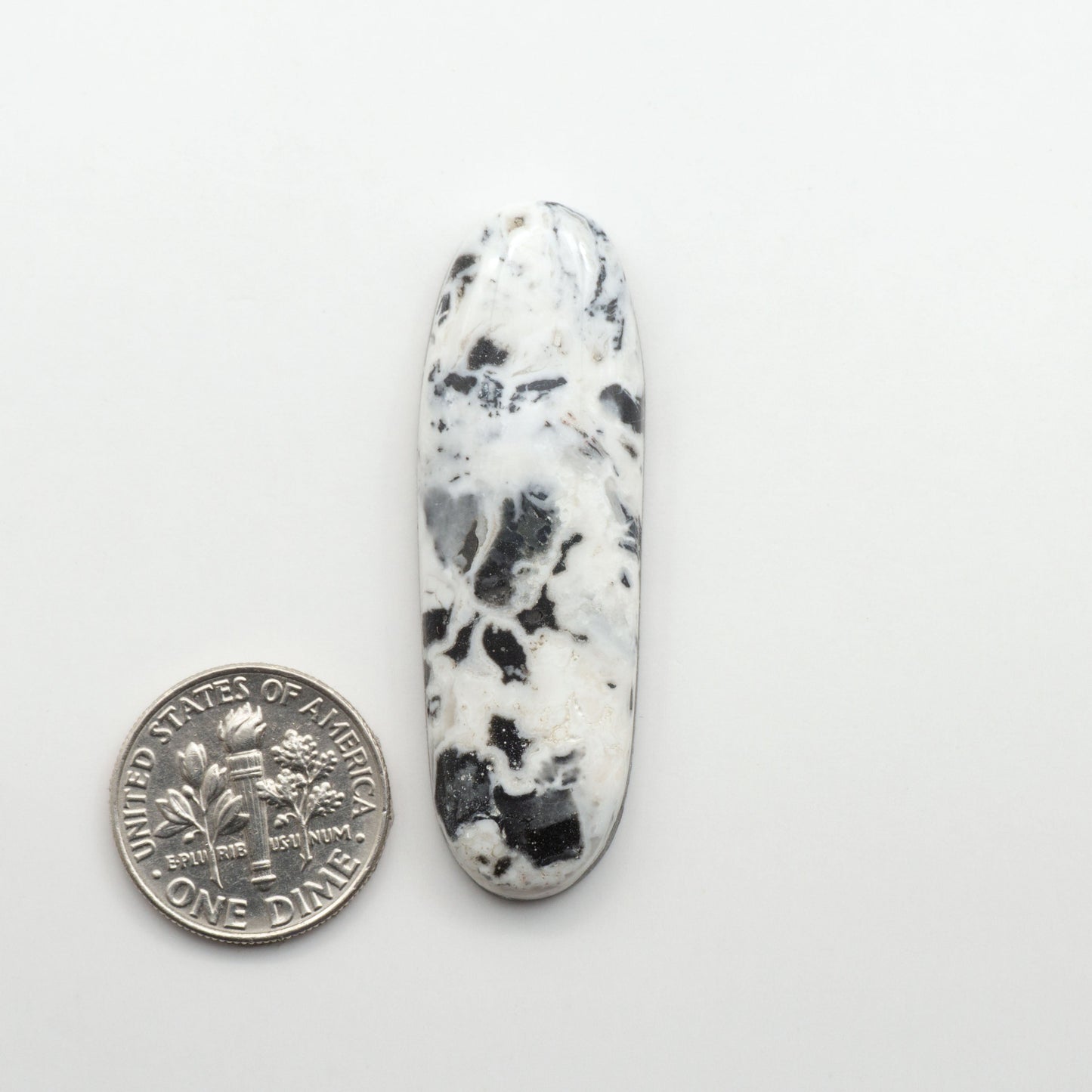 Natural White Buffalo Stone Cabochons are semi-precious gemstones cut into shapes ideal for jewelry-making, making them an excellent choice for artisans.