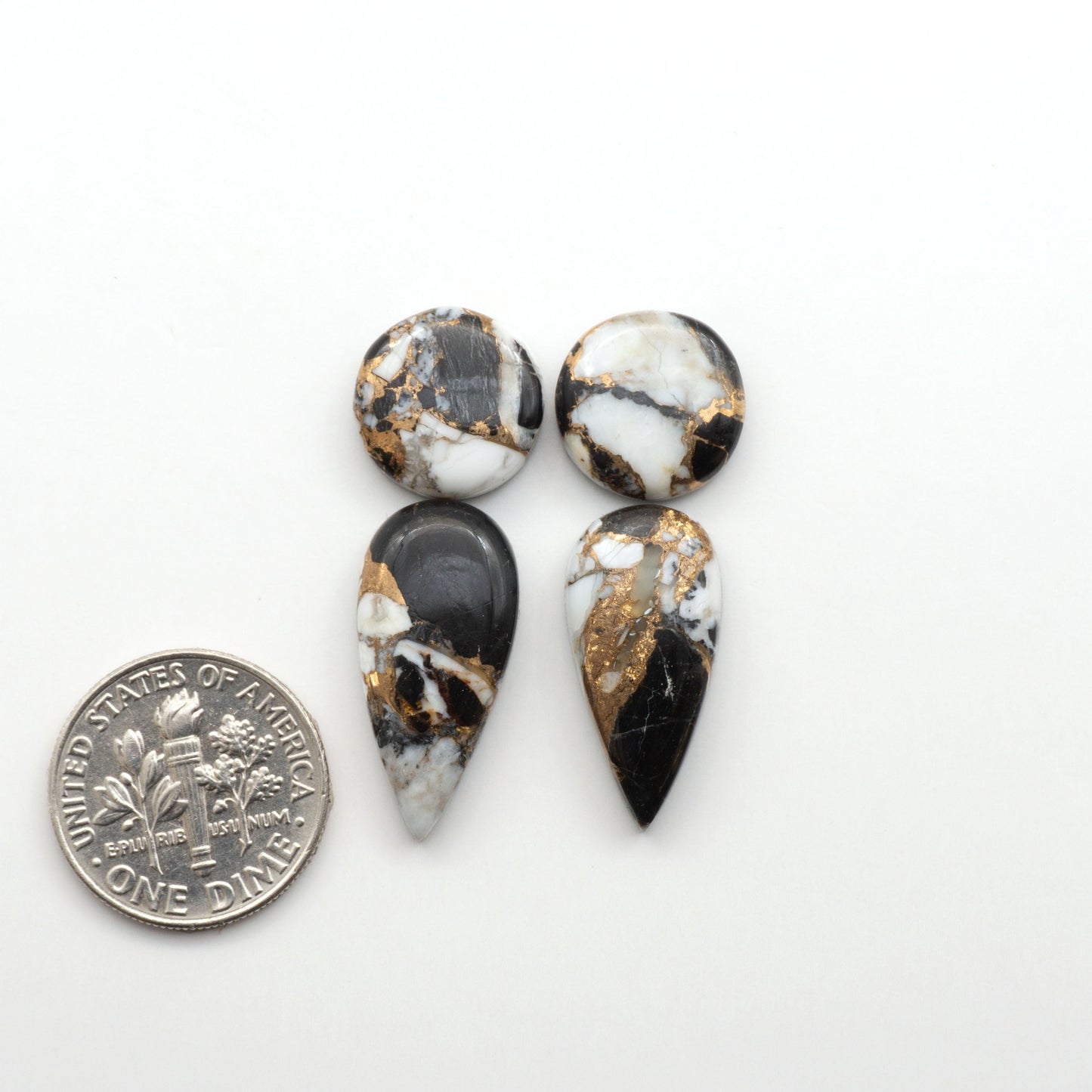 Elevate your jewelry pieces with these stunning White Buffalo Cabochons. With their unique and intricate patterns, they add a touch of elegance to any design.