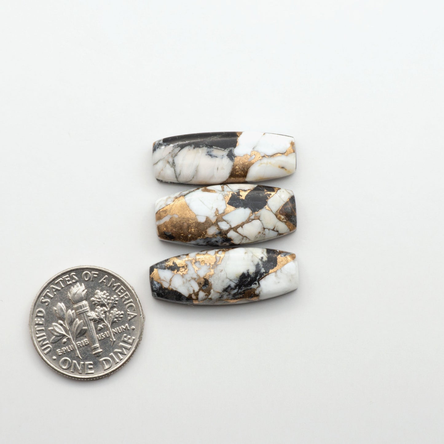 Elevate your jewelry pieces with these stunning White Buffalo Cabochons. With their unique and intricate patterns, they add a touch of elegance to any design.