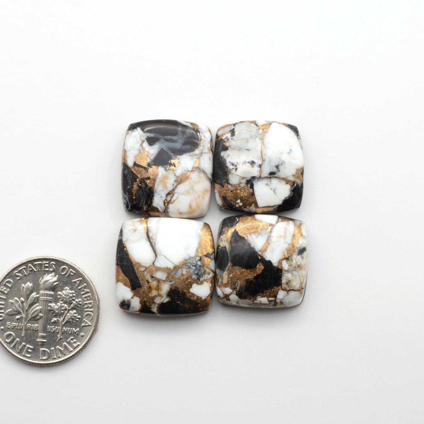 Elevate your jewelry pieces with these stunning White Buffalo Cabochons. With their unique and intricate patterns, they add a touch of elegance to any design.