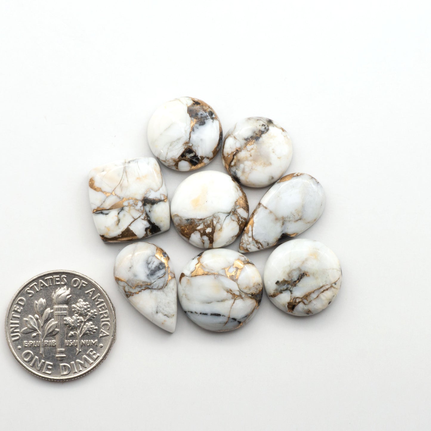 Elevate your jewelry pieces with these stunning White Buffalo Cabochons. With their unique and intricate patterns, they add a touch of elegance to any design.