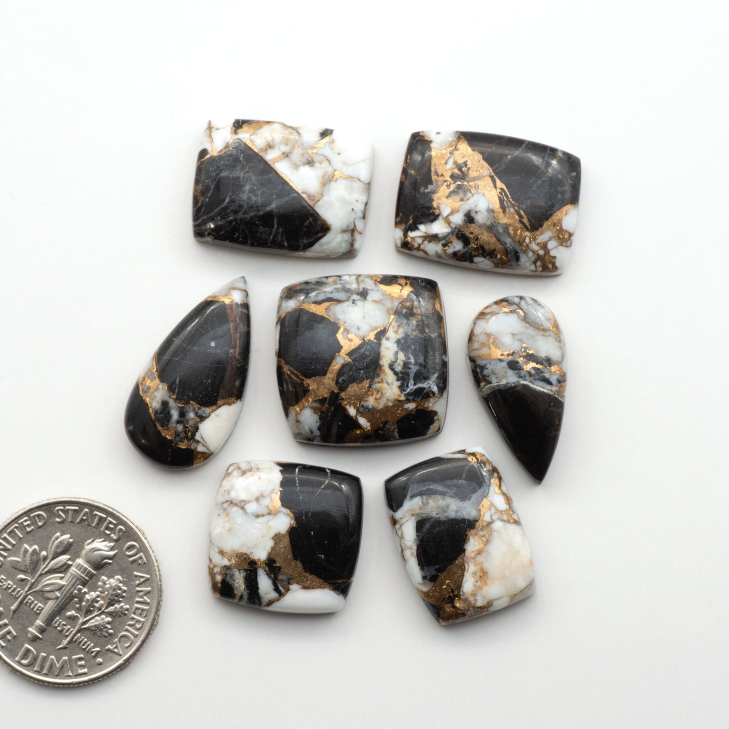 Elevate your jewelry pieces with these stunning White Buffalo Cabochons. With their unique and intricate patterns, they add a touch of elegance to any design.