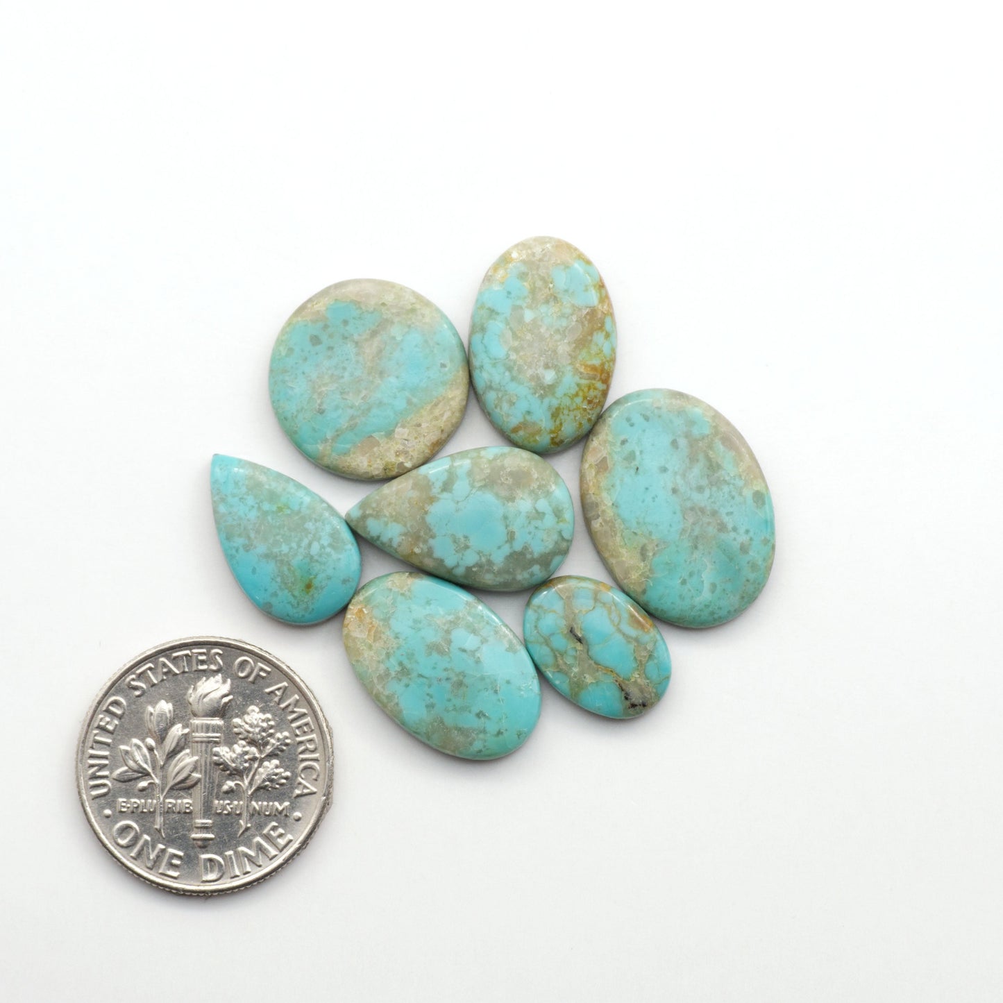 Add a touch of beauty to your collection with our stunning Pilot Mountain Turquoise Cabochons. Perfect for jewelry making each piece is truly one-of-a-kind.