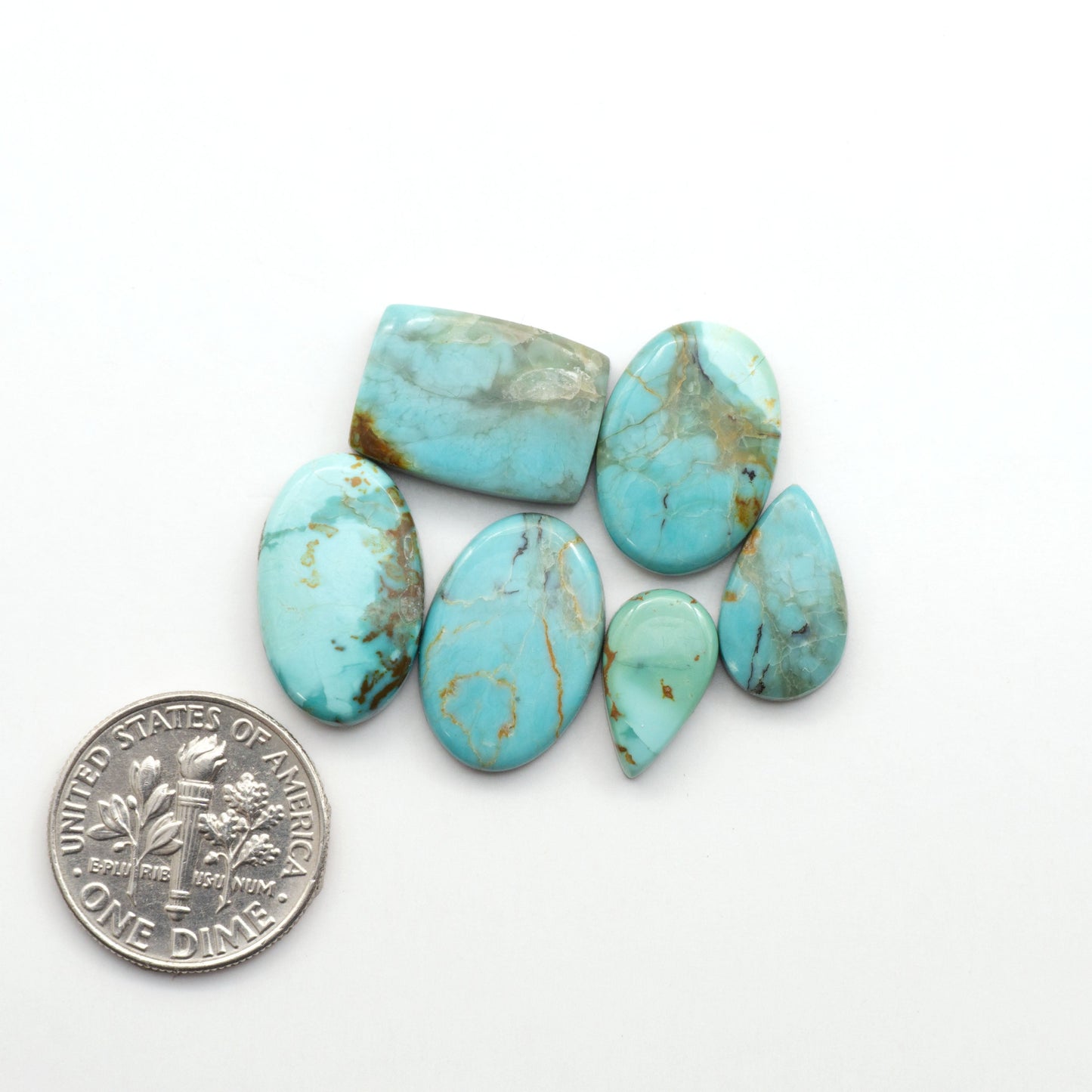 Add a touch of beauty to your collection with our stunning Pilot Mountain Turquoise Cabochons. Perfect for jewelry making each piece is truly one-of-a-kind.