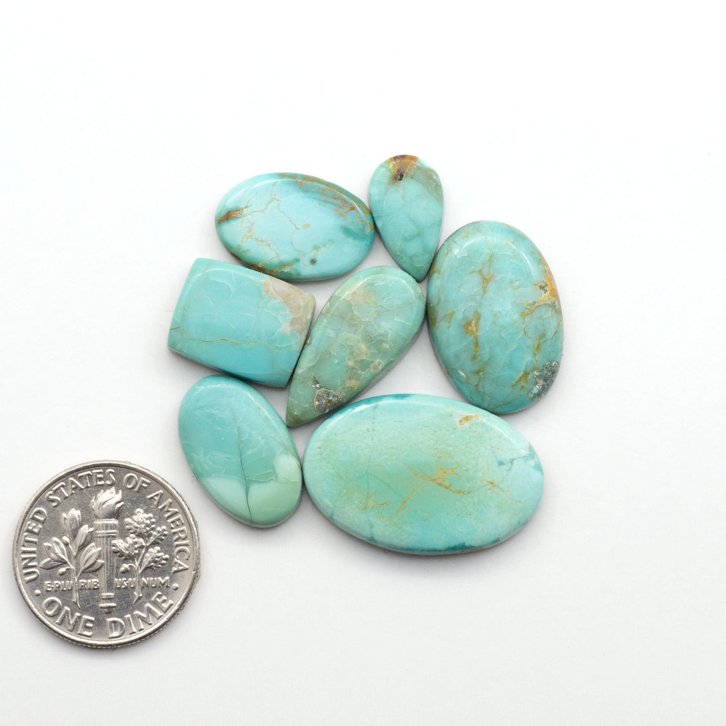 Add a touch of beauty to your collection with our stunning Pilot Mountain Turquoise Cabochons. Perfect for jewelry making each piece is truly one-of-a-kind.