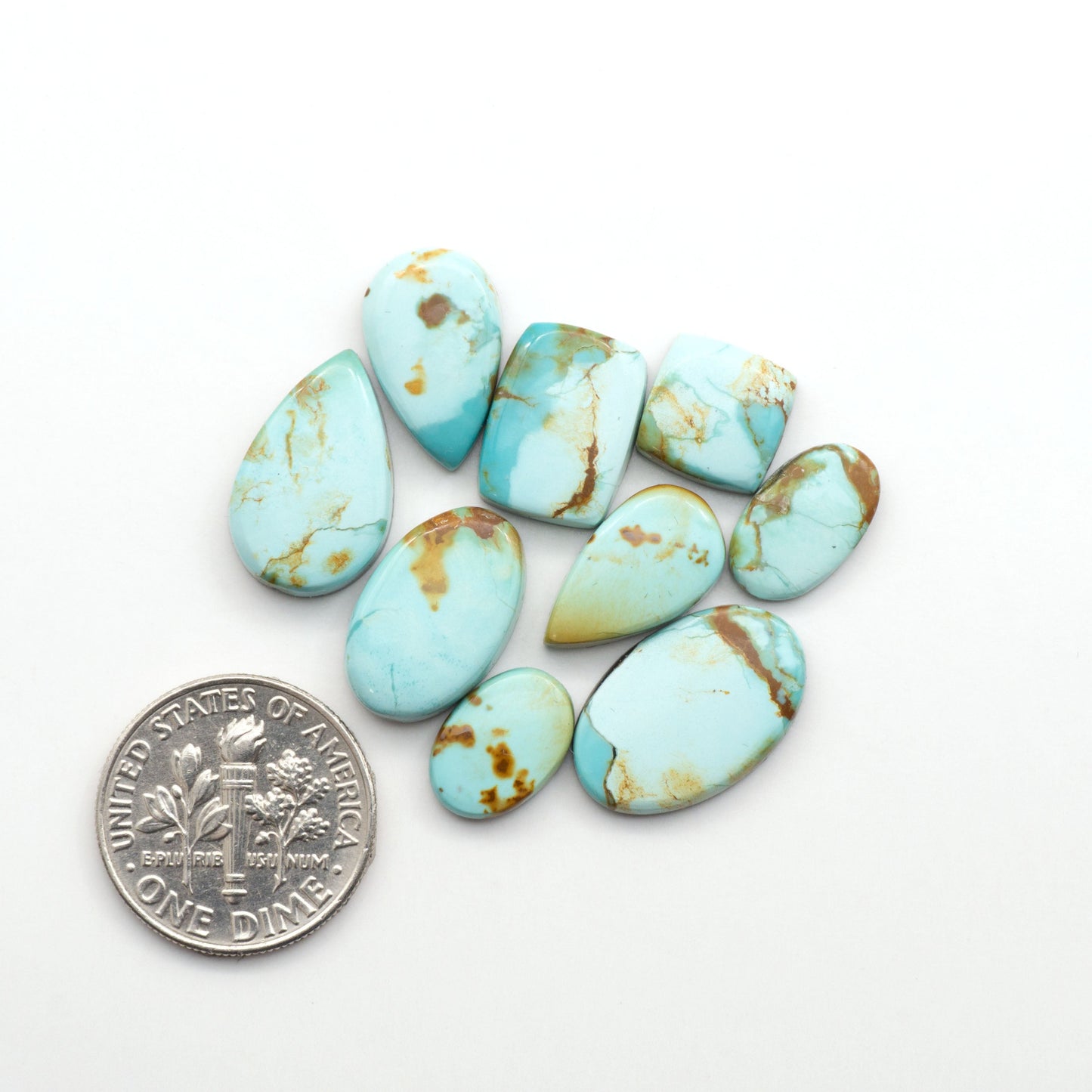 Add a touch of beauty to your collection with our stunning Pilot Mountain Turquoise Cabochons. Perfect for jewelry making each piece is truly one-of-a-kind.