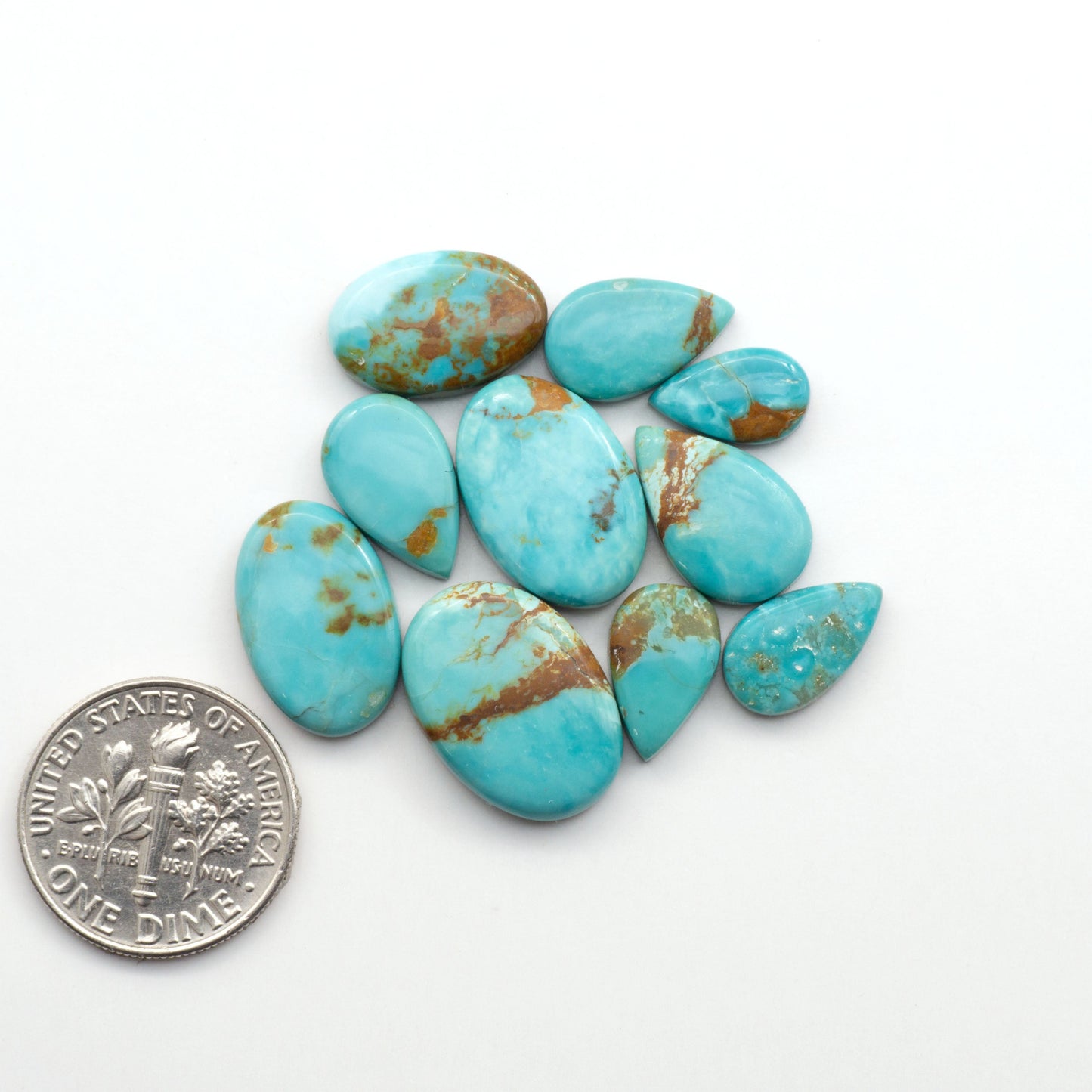 Add a touch of beauty to your collection with our stunning Pilot Mountain Turquoise Cabochons. Perfect for jewelry making each piece is truly one-of-a-kind.