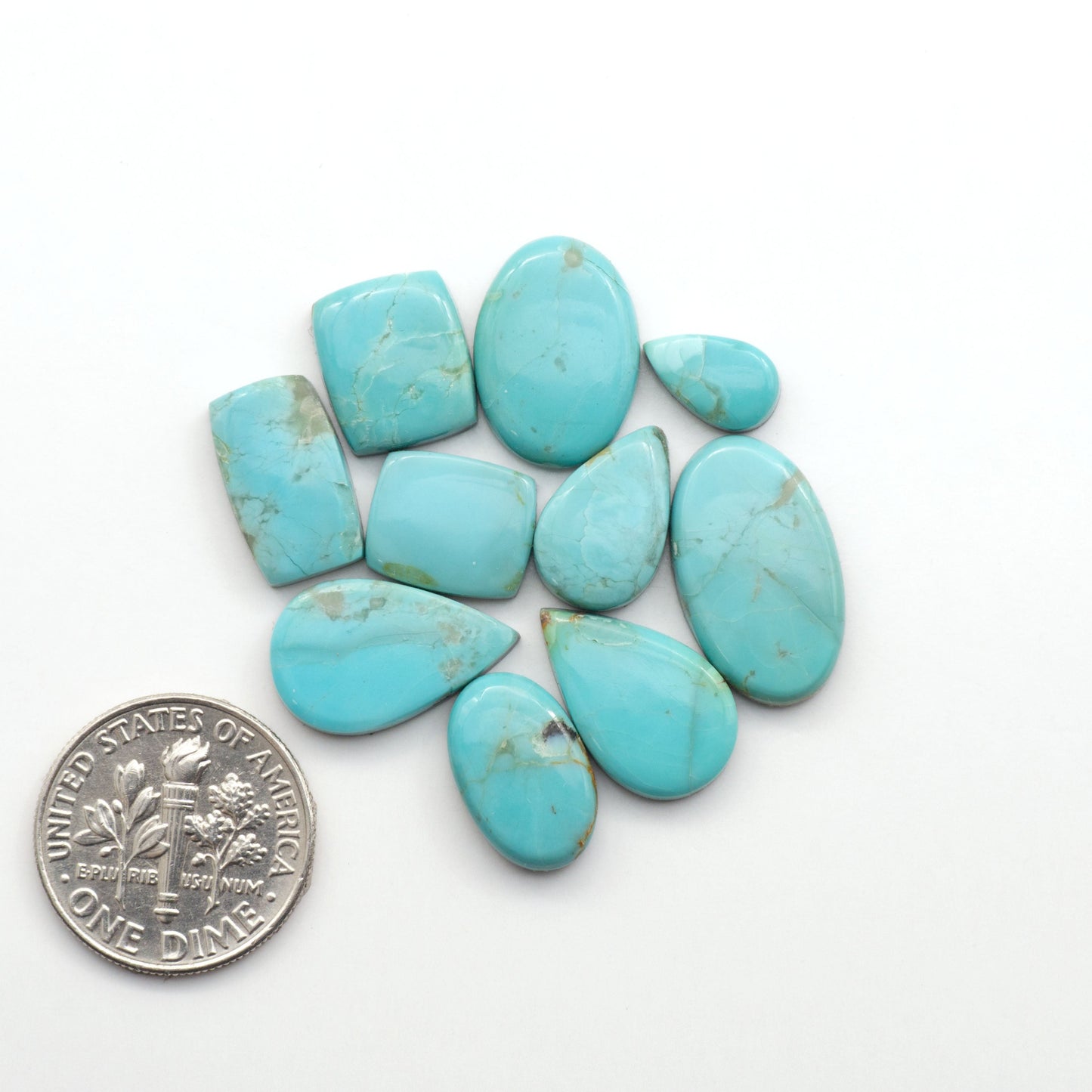 Add a touch of beauty to your collection with our stunning Pilot Mountain Turquoise Cabochons. Perfect for jewelry making each piece is truly one-of-a-kind.