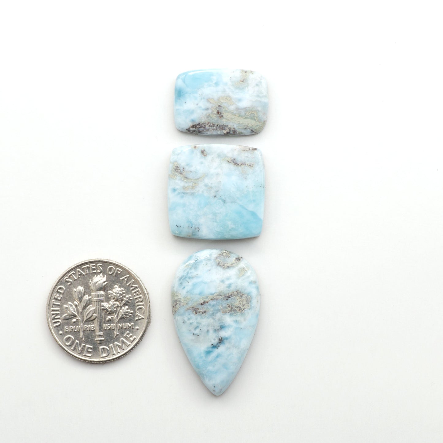 Discover the beauty of Larimar Cabochons. Cut to emphasize the stone's natural patterns and colors. Add a touch of natural beauty to your jewelry designs.