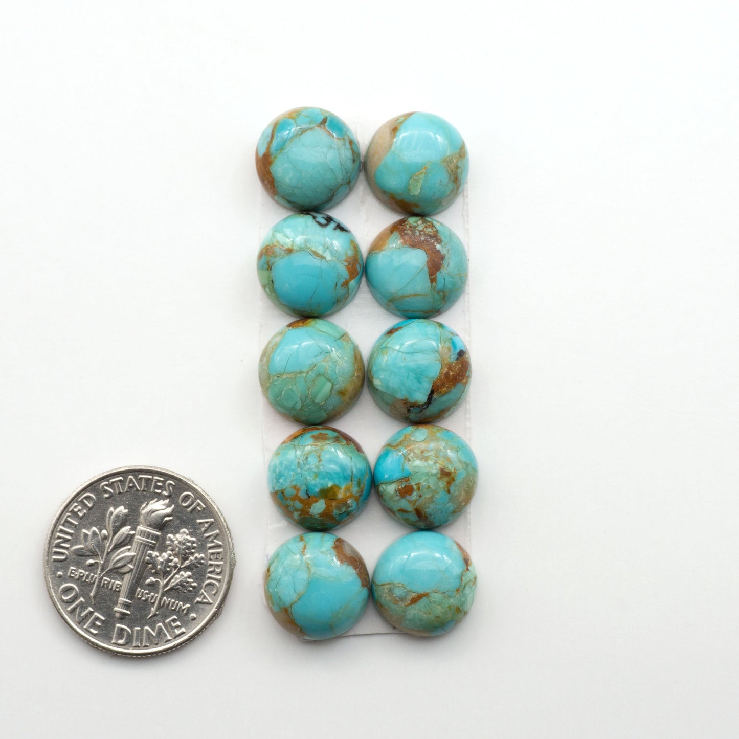 Enhance your jewelry designs with Pressed Turquoise Nugget Cabochons. Crafted from composite materials they add a captivating touch to your creations.