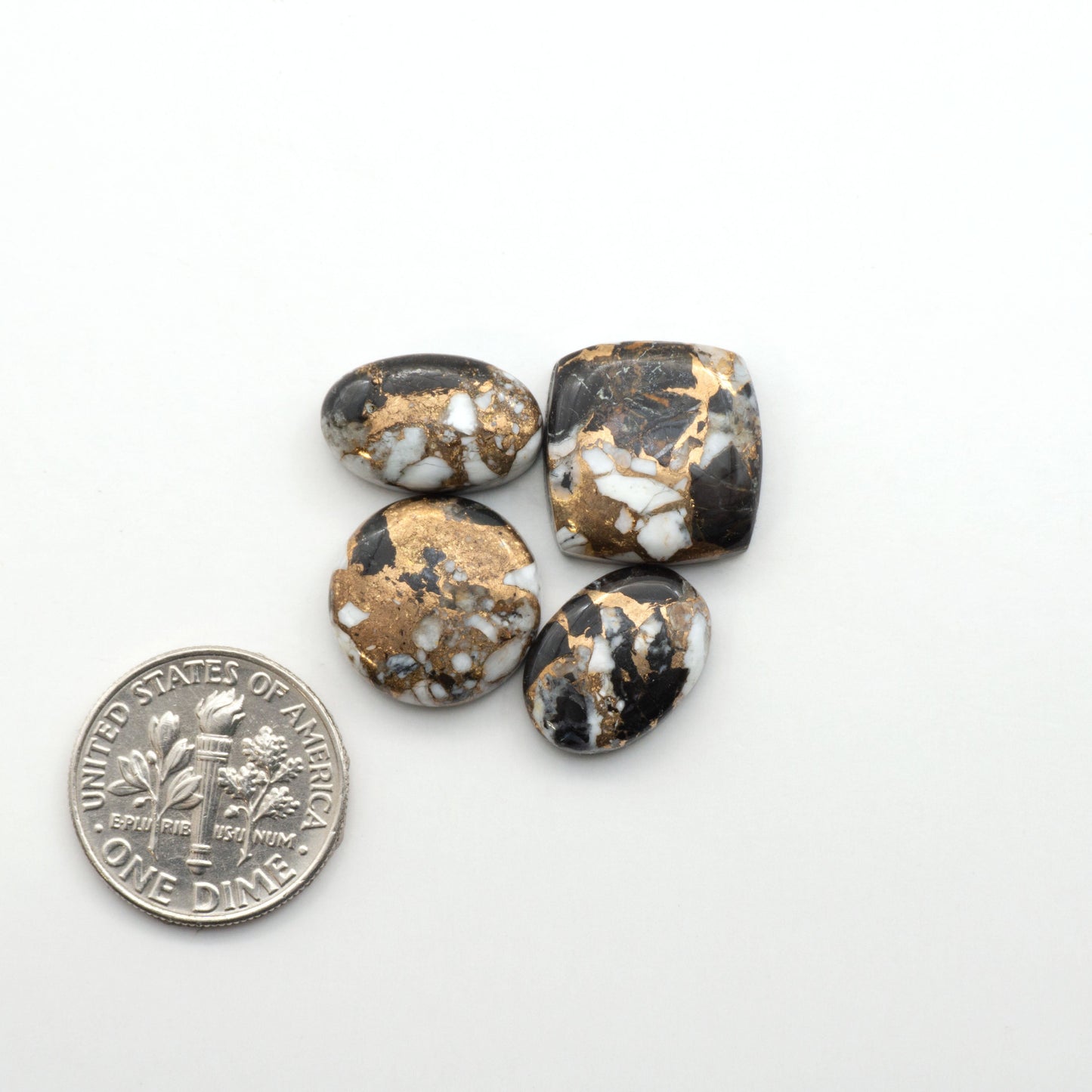 Elevate your jewelry pieces with these stunning White Buffalo Cabochons. With their unique and intricate patterns, they add a touch of elegance to any design.