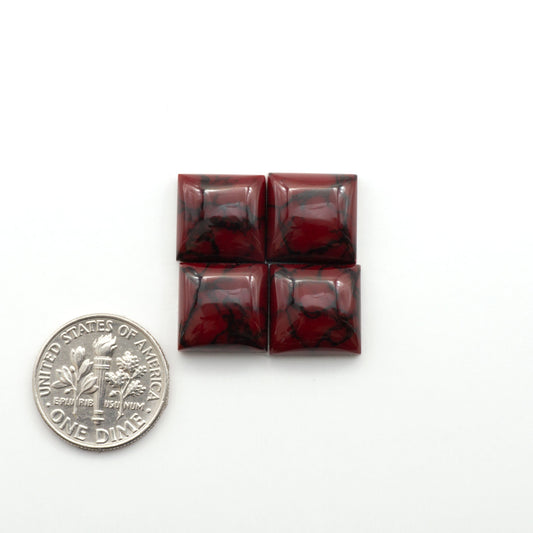 Bloody Bison Jasper is a composite stone with a vibrant red hue and black matrix that creates a strong impression and a touch of opulence to any jewelry piece.