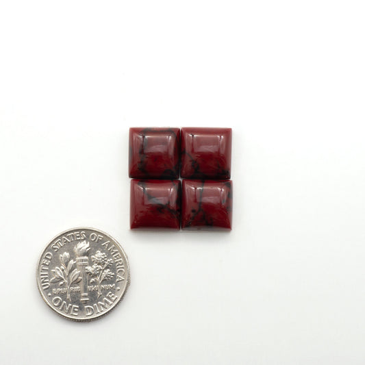 Bloody Bison Jasper is a composite stone with a vibrant red hue and black matrix that creates a strong impression and a touch of opulence to any jewelry piece.