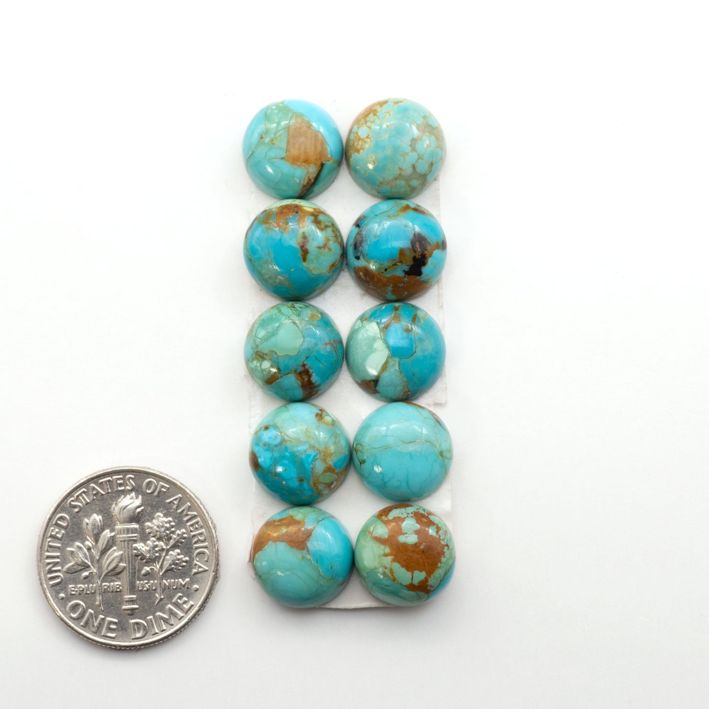 Enhance your jewelry designs with Pressed Turquoise Nugget Cabochons. Crafted from composite materials they add a captivating touch to your creations.