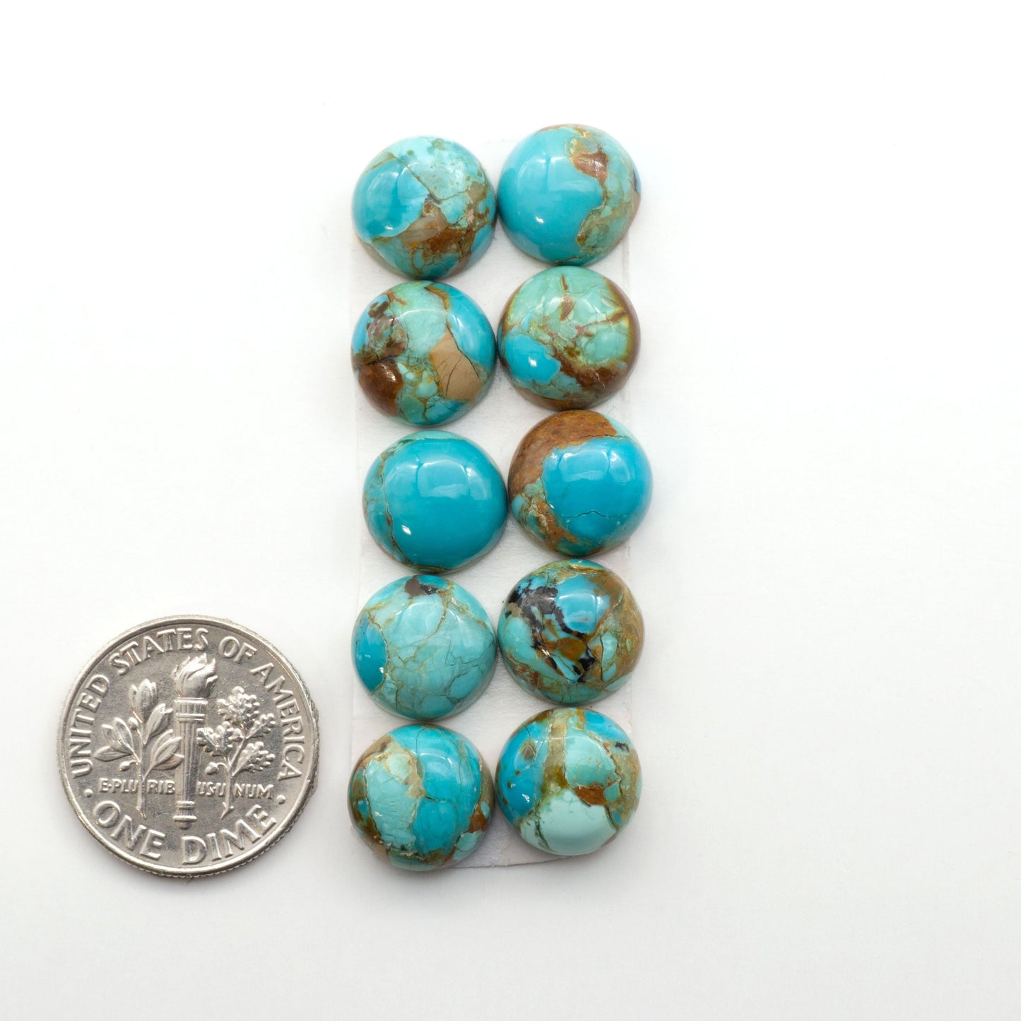 Enhance your jewelry designs with Pressed Turquoise Nugget Cabochons. Crafted from composite materials they add a captivating touch to your creations.