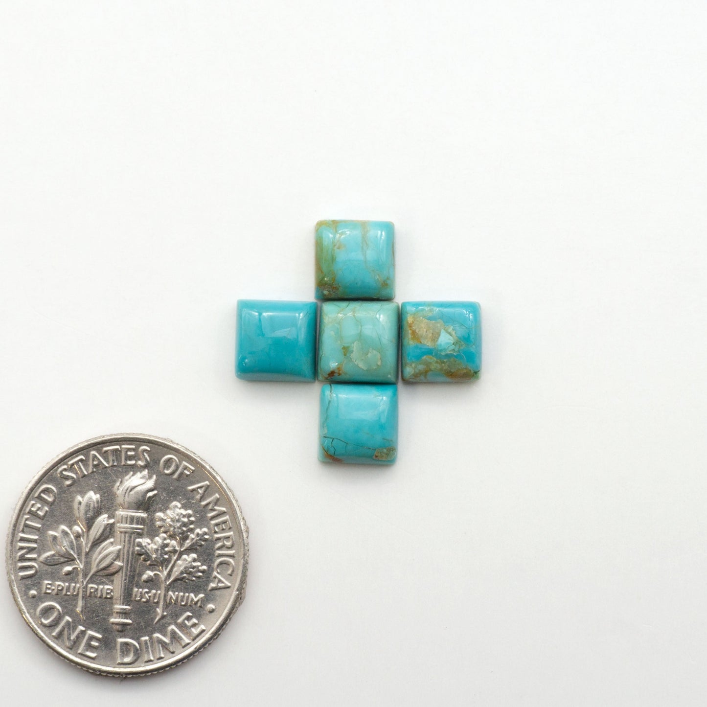 Enhance your jewelry designs with Pressed Turquoise Nugget Cabochons. Crafted from composite materials they add a captivating touch to your creations.