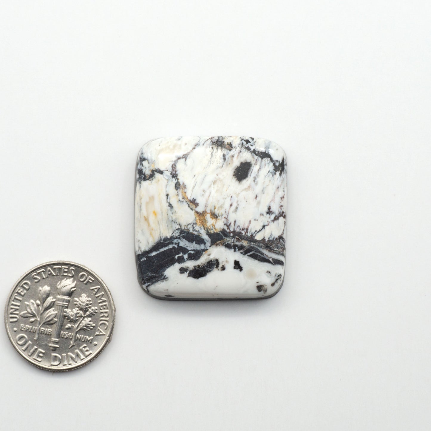 Natural White Buffalo Stone Cabochons are semi-precious gemstones cut into shapes ideal for jewelry-making, making them an excellent choice for artisans.
