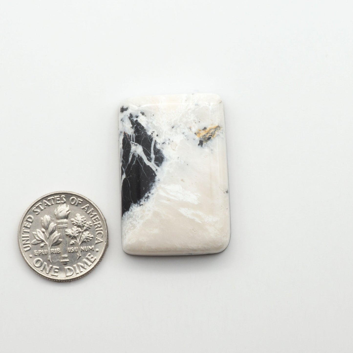 Natural White Buffalo Stone Cabochons are semi-precious gemstones cut into shapes ideal for jewelry-making, making them an excellent choice for artisans.