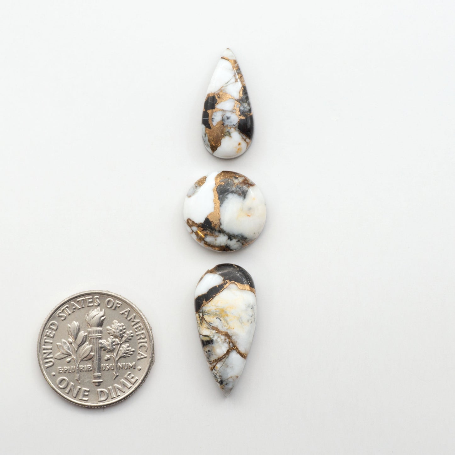 Elevate your jewelry pieces with these stunning White Buffalo Cabochons. With their unique and intricate patterns, they add a touch of elegance to any design.