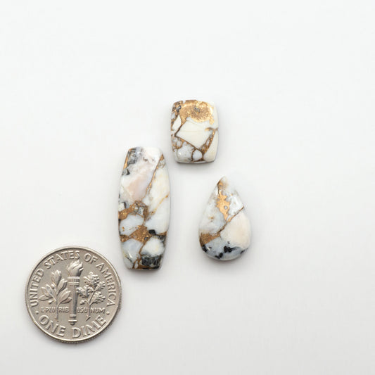 Elevate your jewelry pieces with these stunning White Buffalo Cabochons. With their unique and intricate patterns, they add a touch of elegance to any design.
