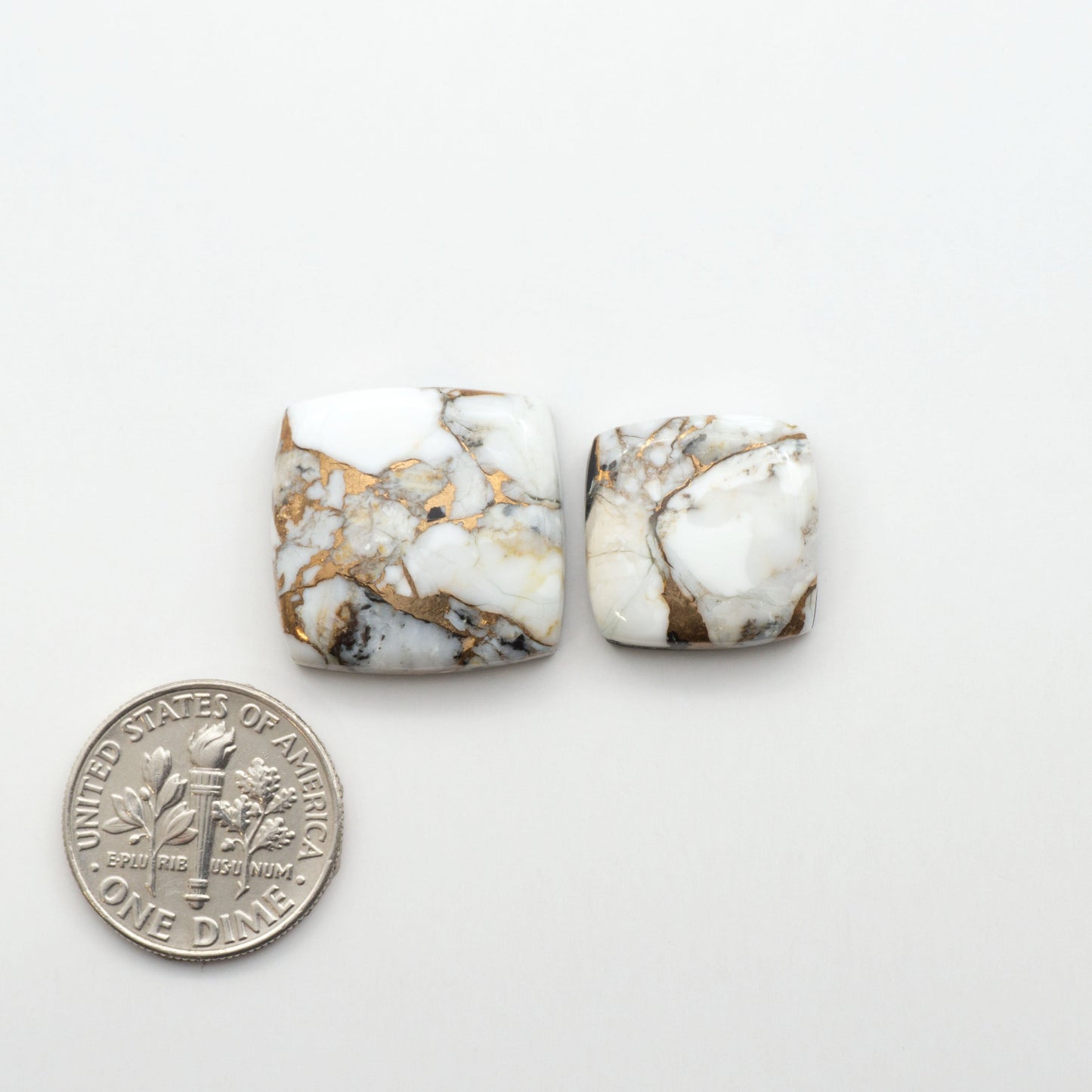 Elevate your jewelry pieces with these stunning White Buffalo Cabochons. With their unique and intricate patterns, they add a touch of elegance to any design.