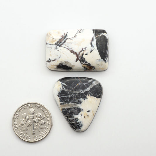 Natural White Buffalo Stone Cabochons are semi-precious gemstones cut into shapes ideal for jewelry-making, making them an excellent choice for artisans.