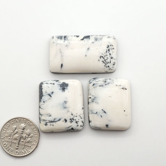 Natural White Buffalo Stone Cabochons are semi-precious gemstones cut into shapes ideal for jewelry-making, making them an excellent choice for artisans.