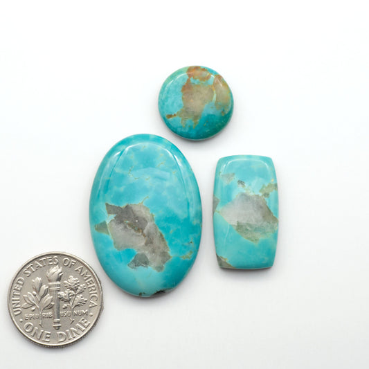 Kingman Turquoise Cabochons are a staple in the jewelry industry, known for their stunning blue-green color. Perfect for necklaces, earrings, and more!