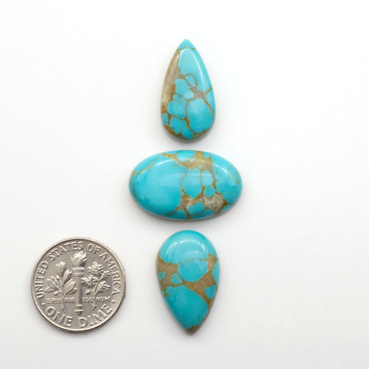 Kingman Turquoise Cabochons are a staple in the jewelry industry, known for their stunning blue-green color. Perfect for necklaces, earrings, and more!