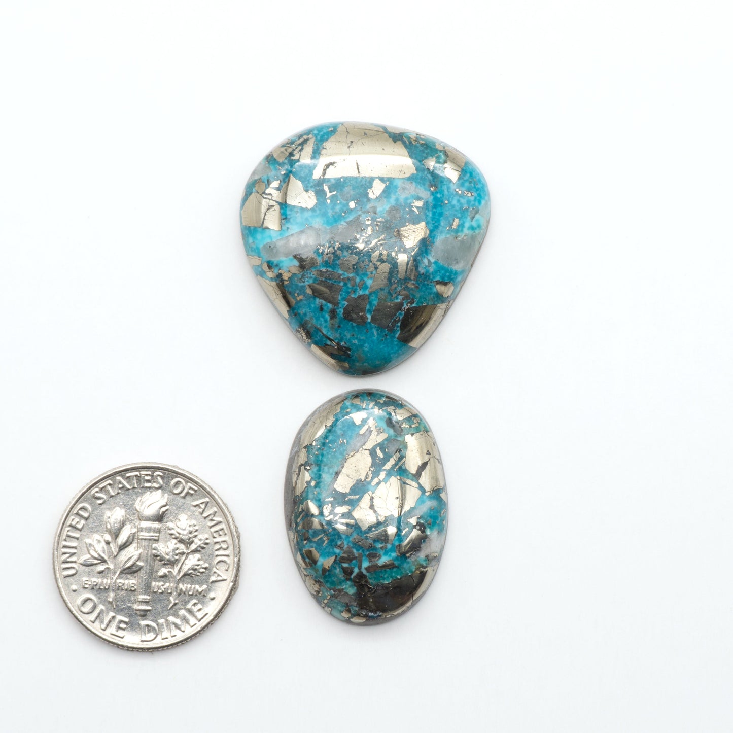 Nacozari turquoise cabochons are striking gemstones known for their vibrant blue to greenish-blue colors and pyrite, these stones are prized in jewelry making.
