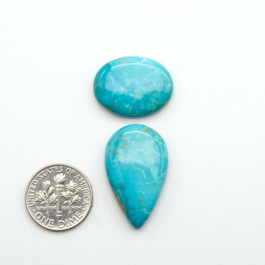 Kingman Turquoise Cabochons are a staple in the jewelry industry, known for their stunning blue-green color. Perfect for necklaces, earrings, and more!