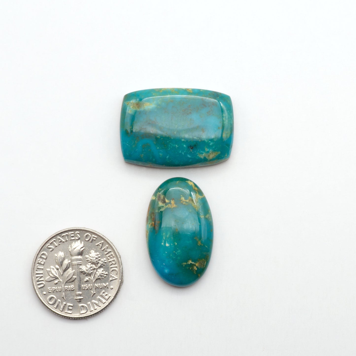 Kingman Turquoise Cabochons are a staple in the jewelry industry, known for their stunning blue-green color. Perfect for necklaces, earrings, and more!