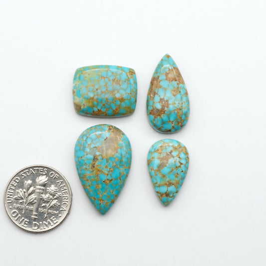 Kingman Turquoise Cabochons are a staple in the jewelry industry, known for their stunning blue-green color. Perfect for necklaces, earrings, and more!