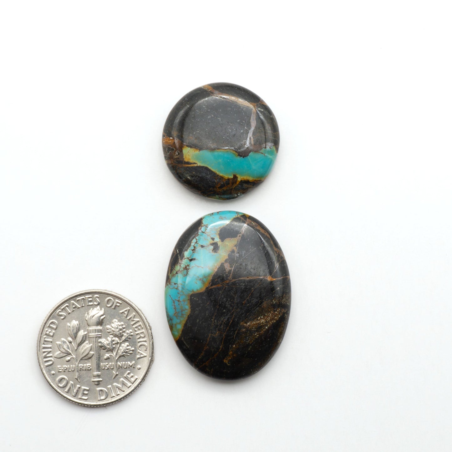 Black Jack Turquoise features a bold black color with striking veins of turquoise, making it a truly one-of-a-kind addition to your jewelry collection.