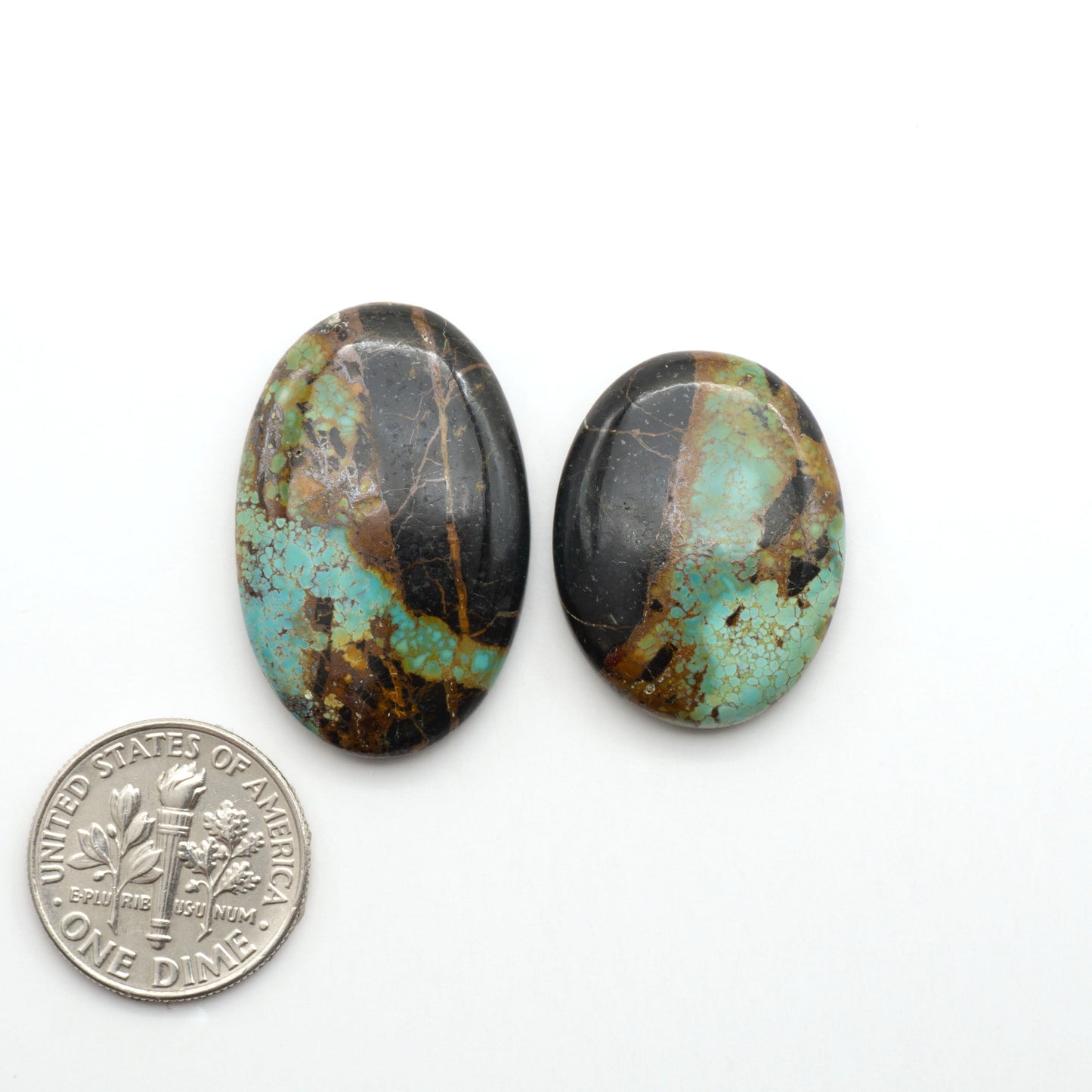 Black Jack Turquoise features a bold black color with striking veins of turquoise, making it a truly one-of-a-kind addition to your jewelry collection.