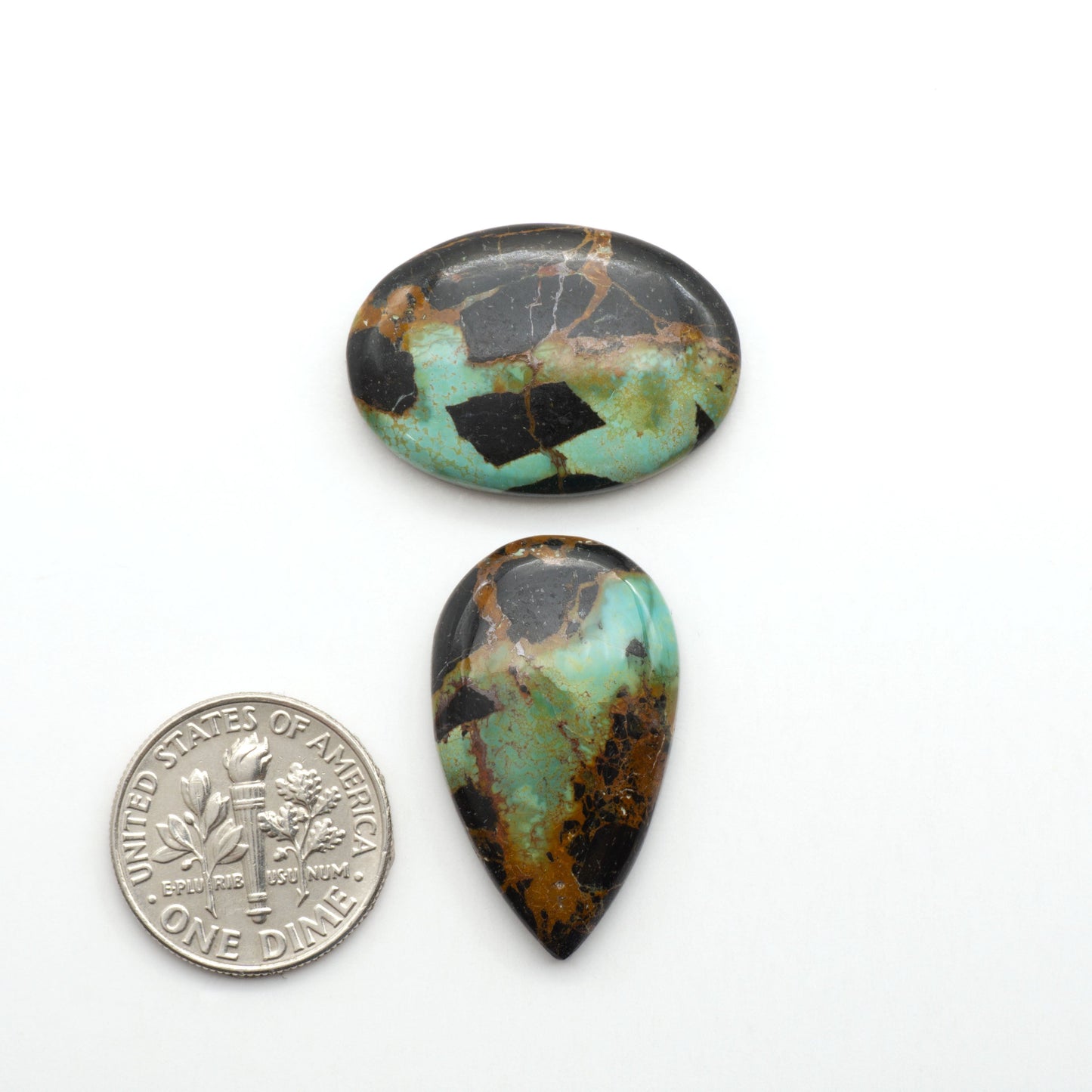Black Jack Turquoise features a bold black color with striking veins of turquoise, making it a truly one-of-a-kind addition to your jewelry collection.