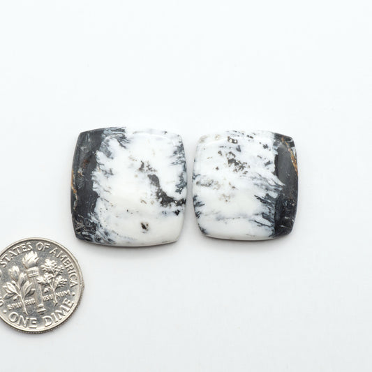 Natural White Buffalo Stone Cabochons are semi-precious gemstones cut into shapes ideal for jewelry-making, making them an excellent choice for artisans.