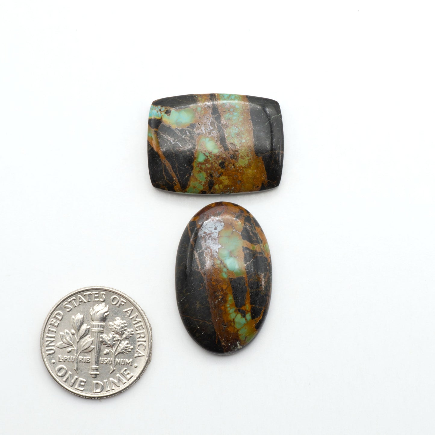 Black Jack Turquoise features a bold black color with striking veins of turquoise, making it a truly one-of-a-kind addition to your jewelry collection.