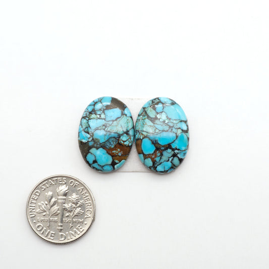 Enhance your jewelry designs with Pressed Turquoise Nugget Cabochons. Crafted from composite materials they add a captivating touch to your creations.