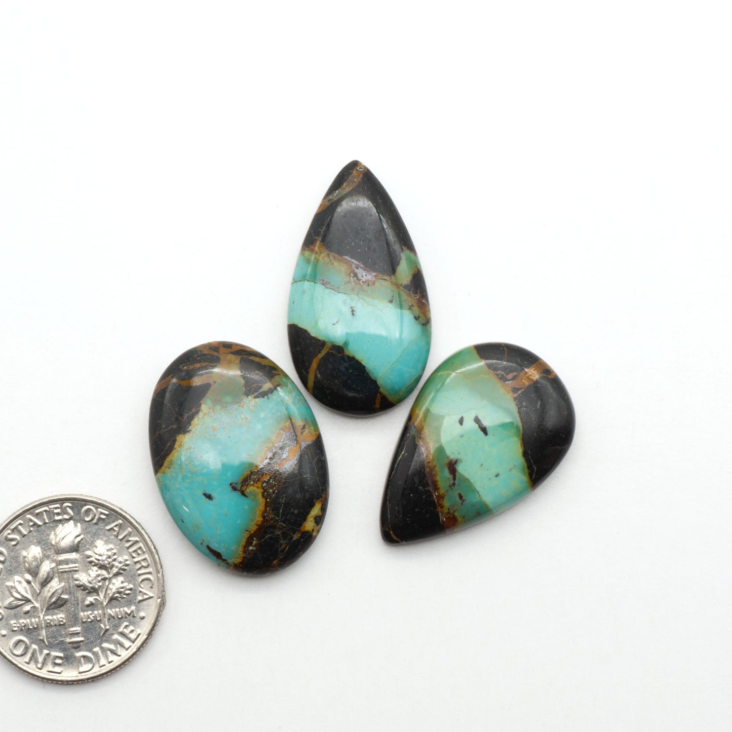 Black Jack Turquoise features a bold black color with striking veins of turquoise, making it a truly one-of-a-kind addition to your jewelry collection.
