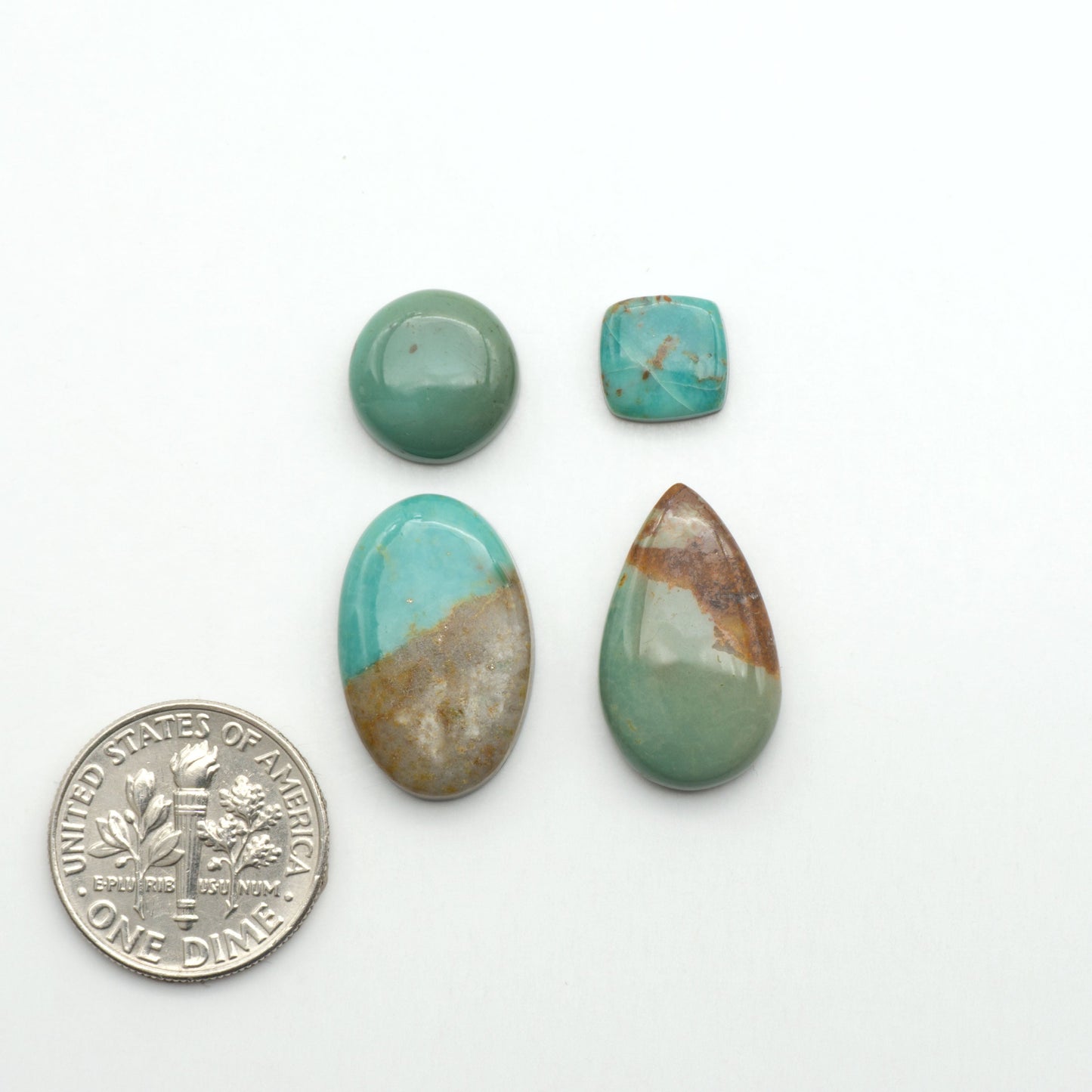 Nacozari turquoise cabochons are striking gemstones known for their vibrant blue to greenish-blue colors and pyrite, these stones are prized in jewelry making.