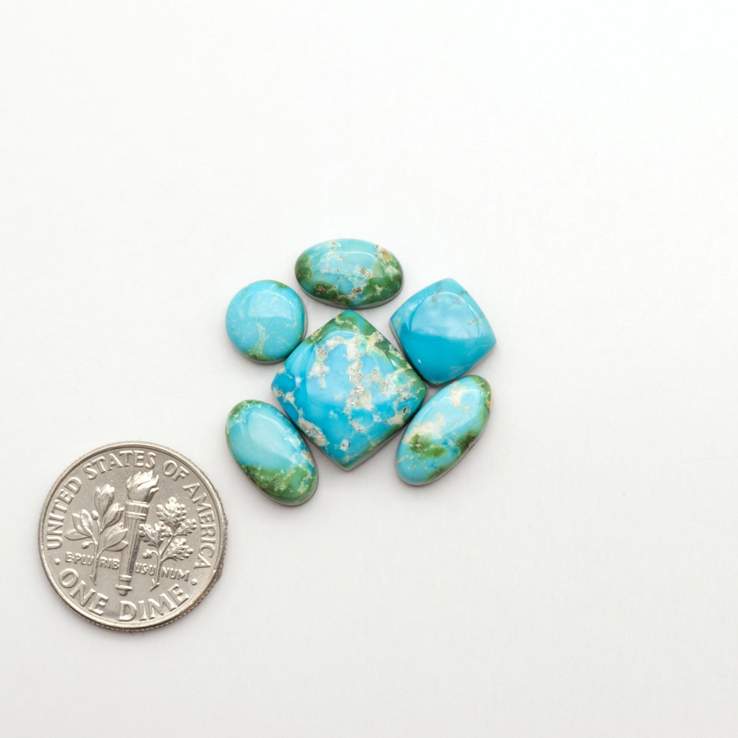Sonoran Mountain Turquoise showcases a stunning blend of blue and green hues and natural patterns that make it a must-have for any jewelry collection.