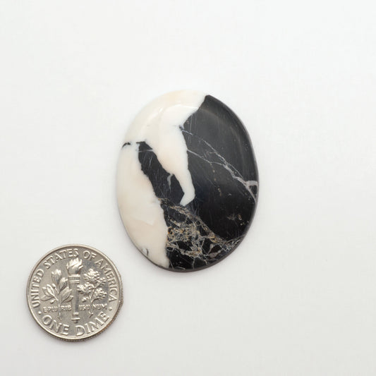 Natural White Buffalo Stone Cabochons are semi-precious gemstones cut into shapes ideal for jewelry-making, making them an excellent choice for artisans.