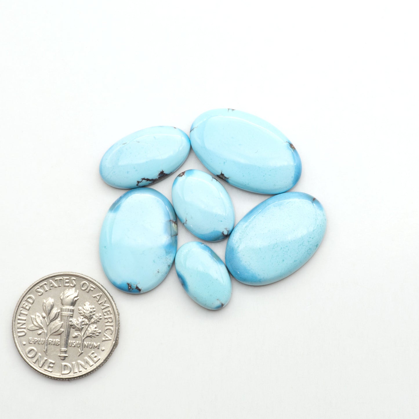 Discover the beauty of Natural Golden Hills Turquoise—prized for its icy blue tones, golden matrix, and exceptional quality. Ideal for artisan jewelry designs.