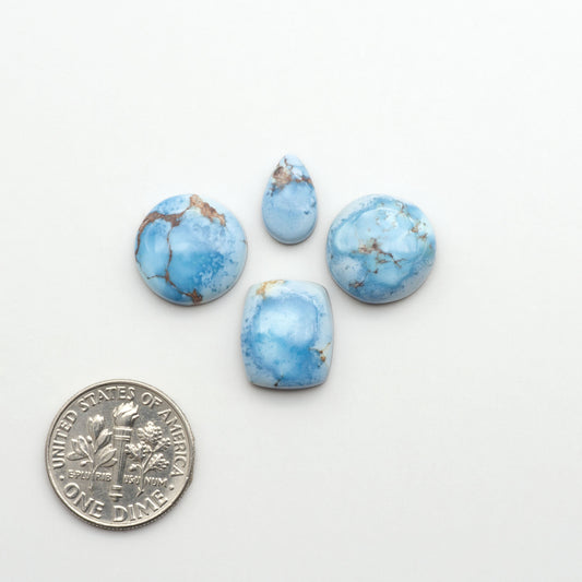 Discover the beauty of Natural Golden Hills Turquoise—prized for its icy blue tones, golden matrix, and exceptional quality. Ideal for artisan jewelry designs.