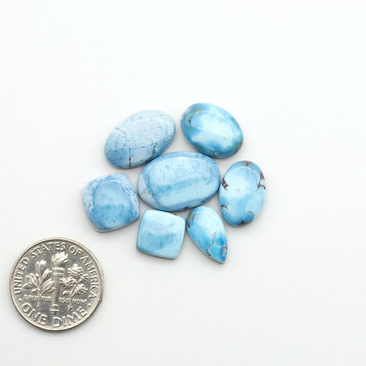 Discover the beauty of Natural Golden Hills Turquoise—prized for its icy blue tones, golden matrix, and exceptional quality. Ideal for artisan jewelry designs.