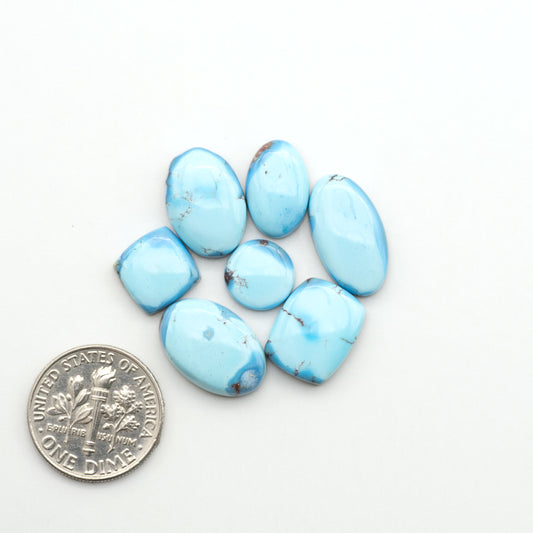 Discover the beauty of Natural Golden Hills Turquoise—prized for its icy blue tones, golden matrix, and exceptional quality. Ideal for artisan jewelry designs.