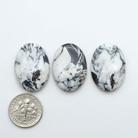 Natural White Buffalo Stone Cabochons are semi-precious gemstones cut into shapes ideal for jewelry-making, making them an excellent choice for artisans.