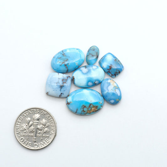 Discover the beauty of Natural Golden Hills Turquoise—prized for its icy blue tones, golden matrix, and exceptional quality. Ideal for artisan jewelry designs.